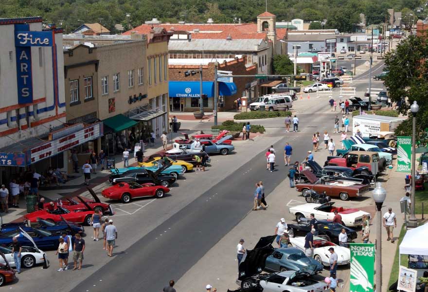 Aerial view of a muscle car show on The Square in downtown Denton